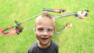 Yard work with dad. Cleaning up around the back deck with toys and real yard tools