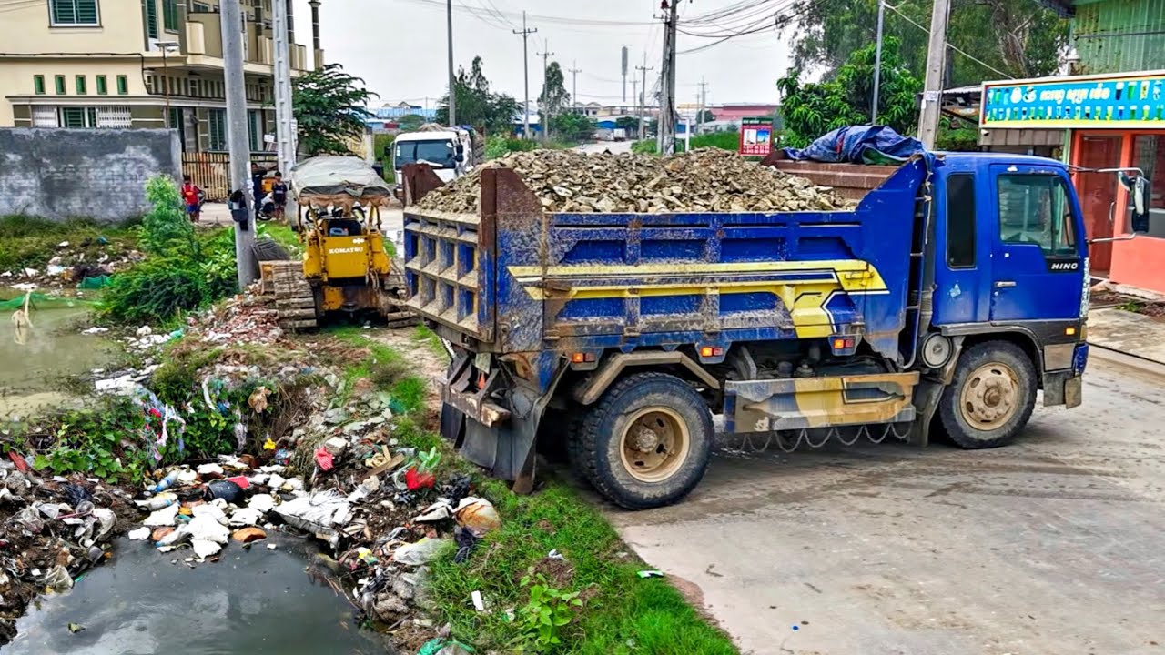 Starting A New Project!! Filling Land By Dump Truck Unloading Soil with Komat'su D20P Dozer