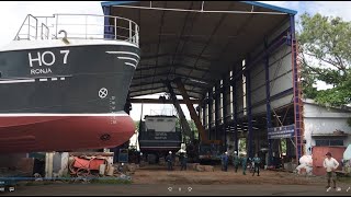Shipping dredgers from shed to river