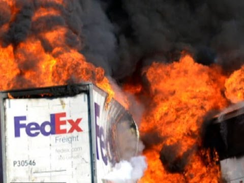 Witness: FedEx truck on fire before hitting bus full of students
