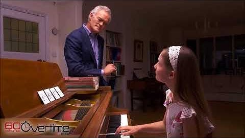 Watch a child prodigy create from four notes in a hat