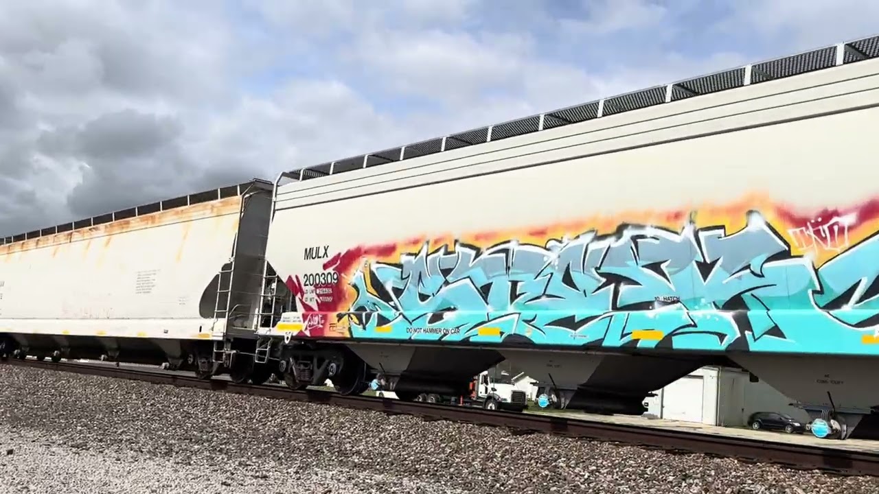 EB this afternoon with BNSF power and a awesome crew and mixed freight with graffiti. 