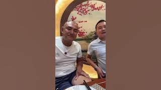 A ferry, people waiting on both sides of the water