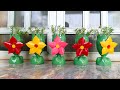 Recycling plastic bottles into colorful flower pots for your small garden