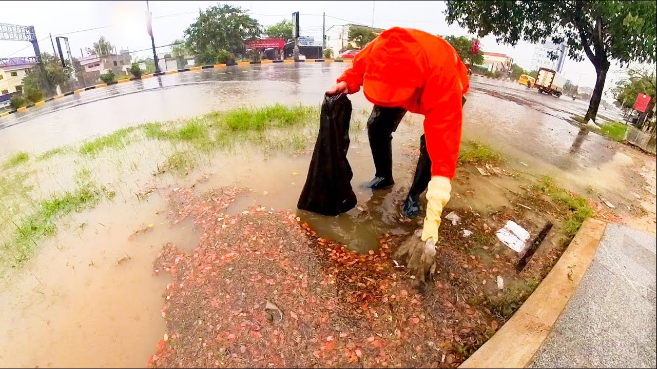 Remove Trash Clogged Culvert Drain Rain Water On Road After Heavy Rain ...