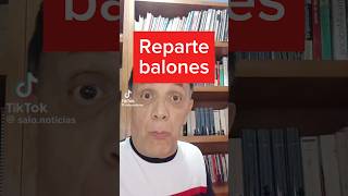Abelardo de la Espriella hands out soccer balls