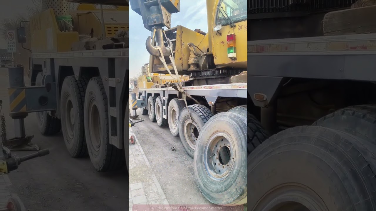 Crane lifts the tire, live on-site operation footage