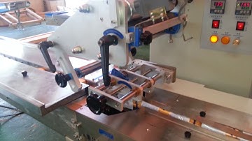 Full automatic high speed flow pack sandwich biscuit packing machine with feeder