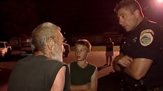 Cops Tv show Des Moines Iowa. Elderly man startled by 12 year old looking for dog. (2003).