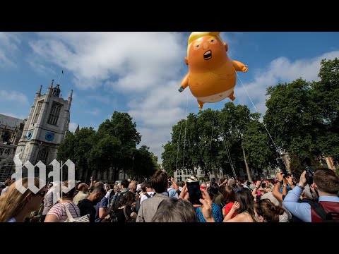 Britain greets Trump with protests