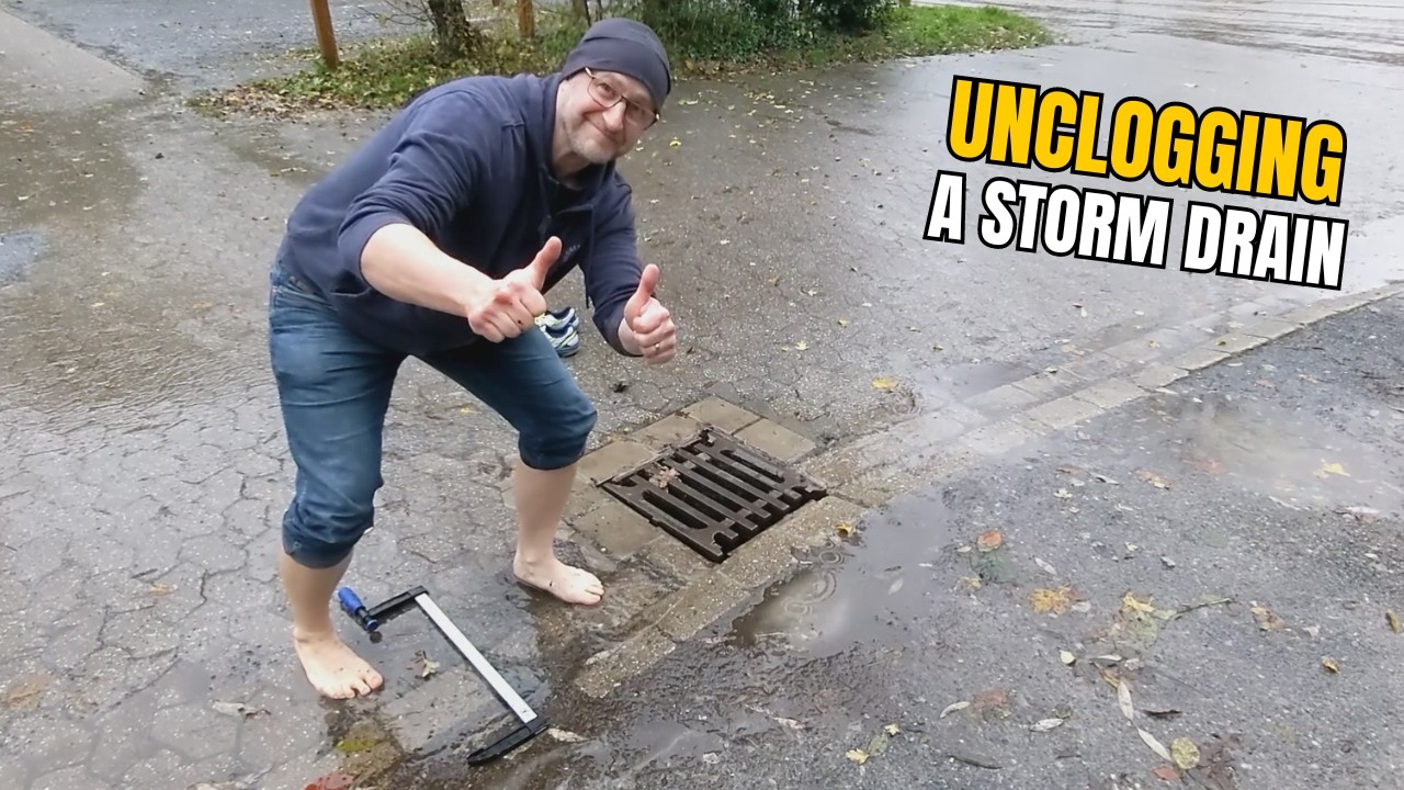 #009 Unclogging a storm drain after rain on a gravel car park in ...