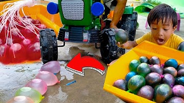 พี่ปลื้ม | รถไถรถแบต VS ลูกโป่งน้ำ ลูกโป่งน้ำใส่สี