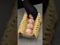 Oven-baked meatballs. Why do they put whole eggs in the middle?
