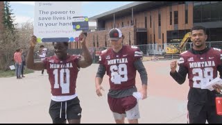 UM football players raise awareness for bone marrow donors