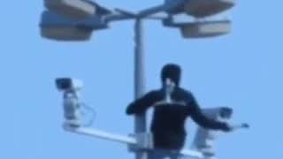 Man Deals With CCTV Cameras With Hammer