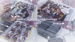 Storing trading cards while reporting on the release event] TWICE