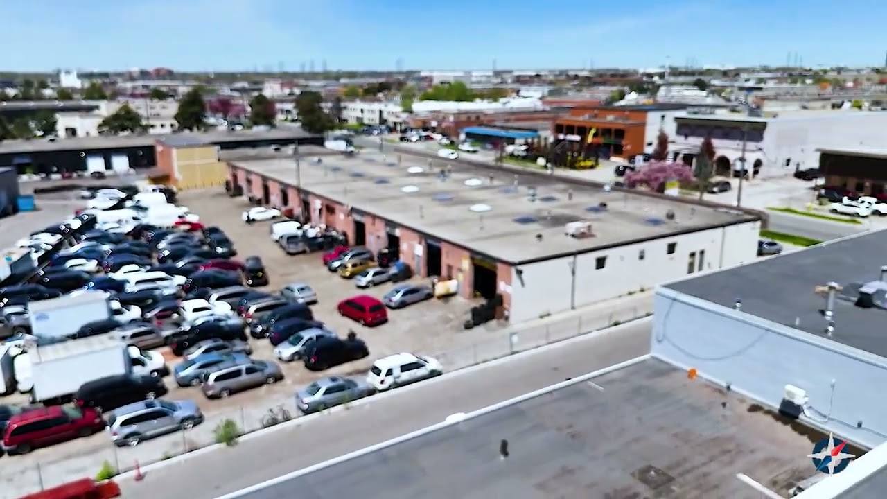 Still from NorthCan Roofing's own film: 58 Milvan Drive, North York