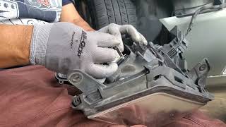 REPAIRING MY CADILLAC DTS HEADLIGHT AGAIN