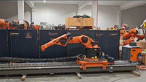 KUKA KR30-3 Industrial robot on track and two rotary positioners at Eurobots