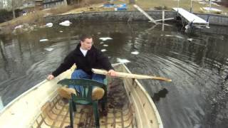 boat sinking in the frozen lake