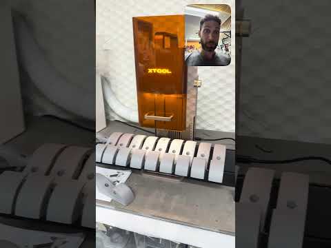 Batch processing 3D printed parts on a laser
