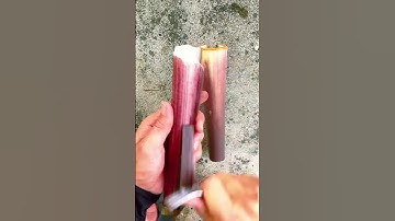 The process of peeling the skin of the taro stem using a spoon and fork. #shorts