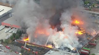 Massive fire engulfs California industrial building