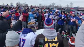 Bills fan smashes table with help from Lions fan !!!