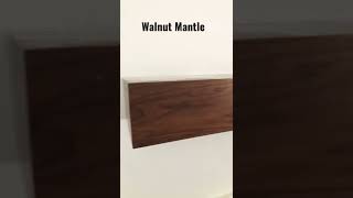 Custom walnut mantle installed in the new house
