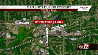 Man robbed, shot while in parking lot of Winston-Salem hotel