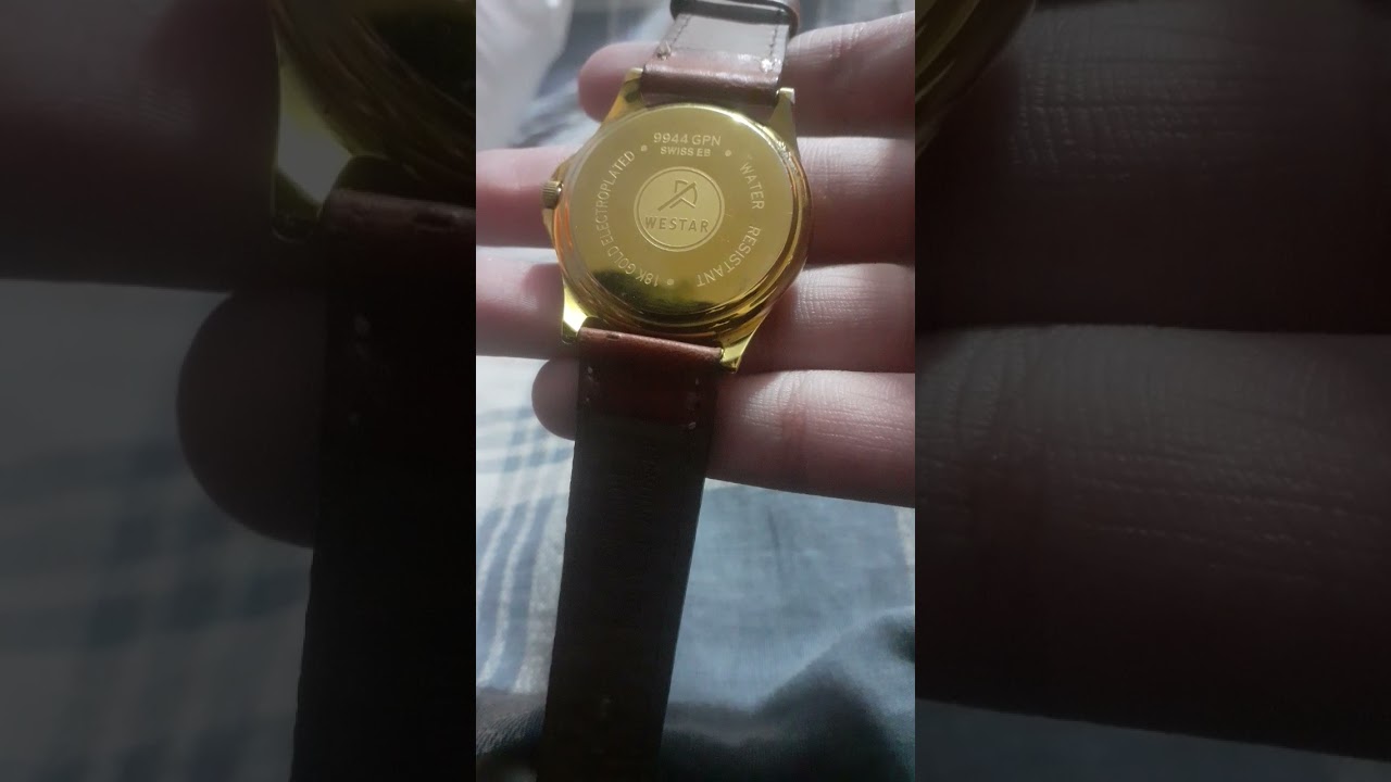 Westar quartz 18K gold Watch.