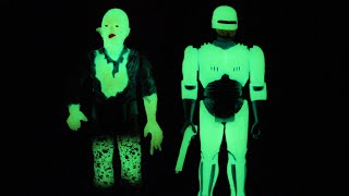 Super 7: Reaction: Glow in the dark Robocop & Emile figure review