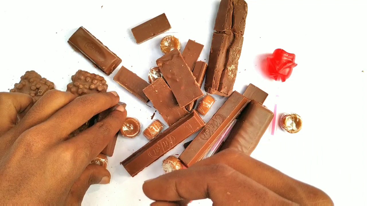 Lot's of Candie's experiment on Chocolate, munch, dairy milk, KitKat