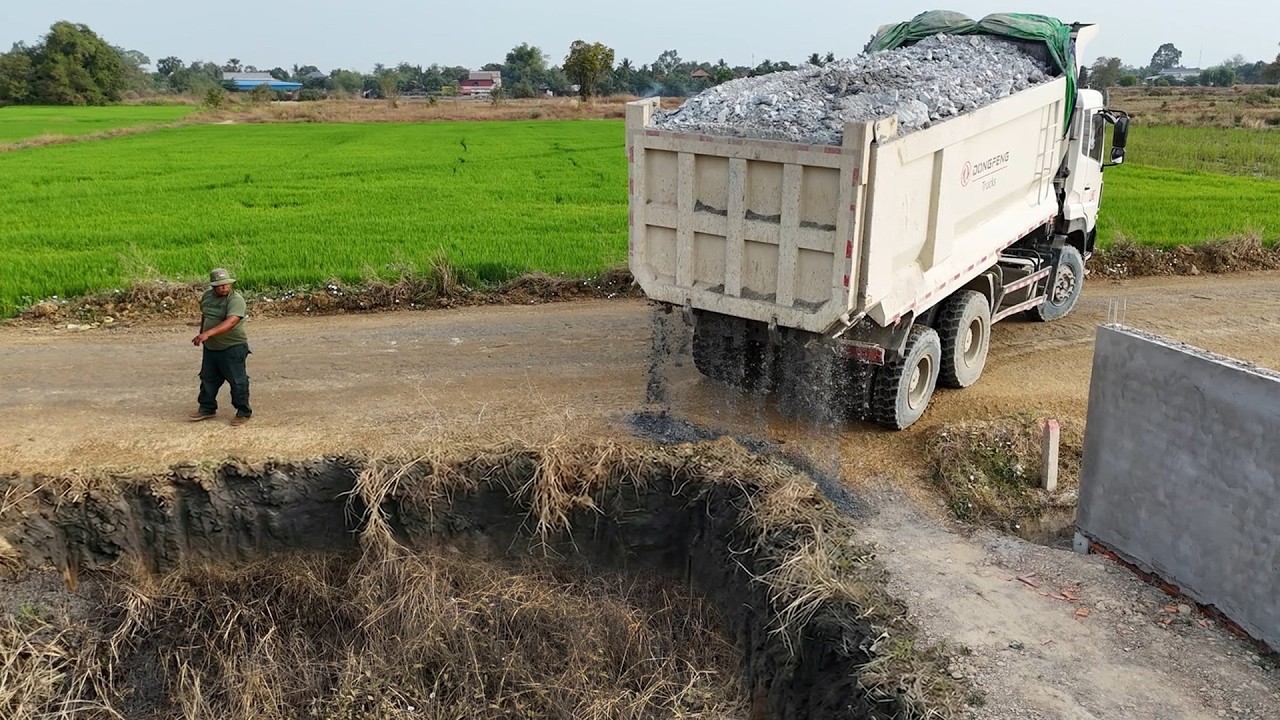 OMG! Great working Dump trucks Dumping Stone and push fill by Huge Bulldozer