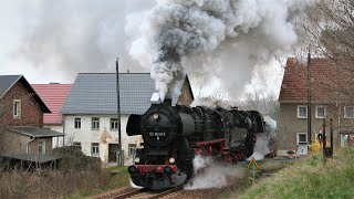 Heavy cement train with two steam locomotives  52 8029 + 52 8047 on the inclines around Nossen