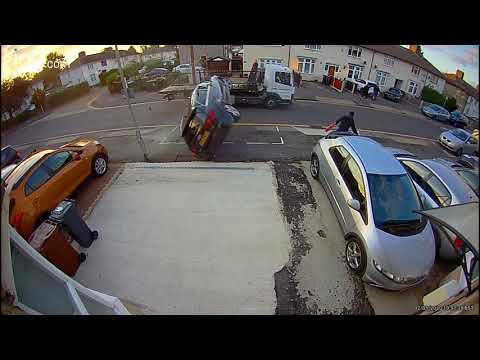 Car Flips Over When A Driver Tries To Overtake A Recovery Vehicle