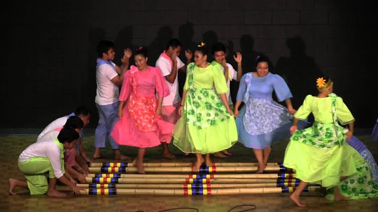 Tinikling Dance By the AMCC-Cultural Arts Guild - YouTube