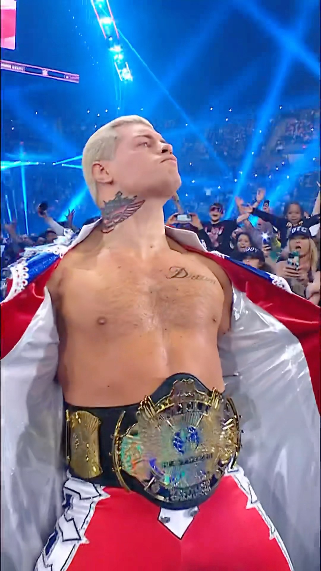 Cody Rhodes makes his entrance with the Winged Eagle Championship