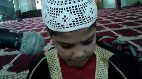 الشيخ يوسف عثمان عبد المنعم العبيدو ٩ سنوات يتلو سورة النبأ في جامع ال الدراحي بغداد