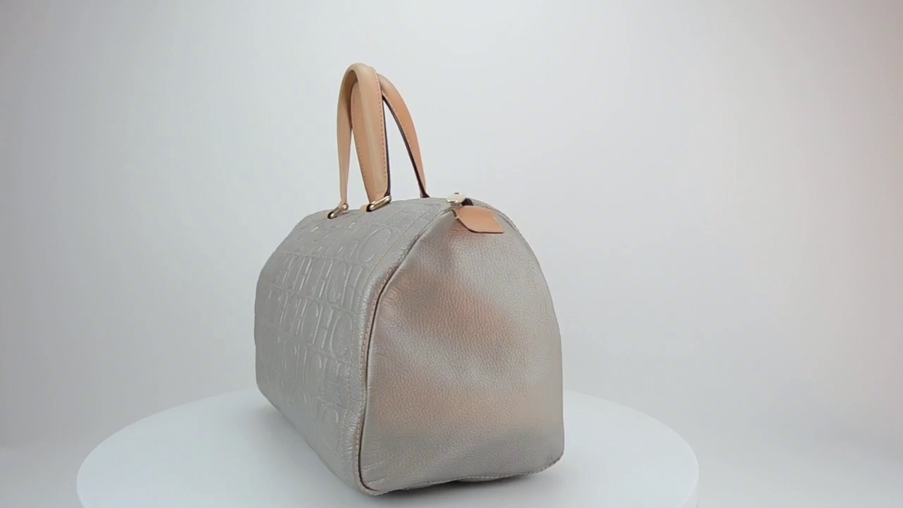 Bolso Carolina Herrera, modelo Andy 10, plata. YouTube