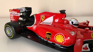 Ferrari racing model | ups f1 burago sf15-t sebastian vettel 2015
diecast 1:18 scale