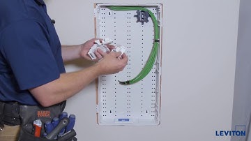 Installing the Hinged Vented Door on a Wireless Structured Media Center