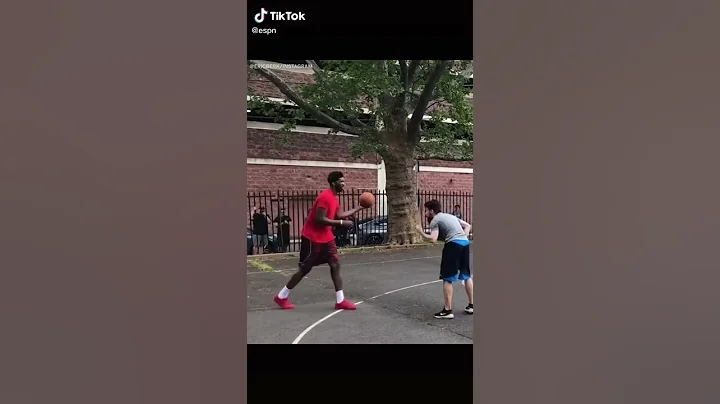 Joel Embiid windmilling on kid in park