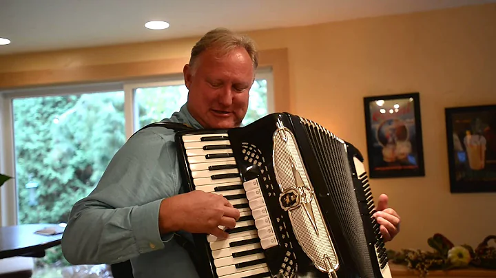 Ron Mindykowski plays accordion