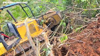 The Great Power Small Caterpillar D5K Bulldozer Working in The Woods P2