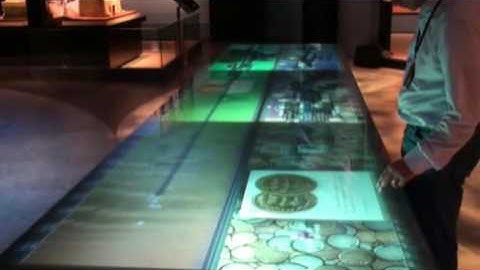 Giant historic timeline multi touch table installation