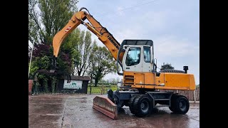 LIEBHERR 924C-HD HIGH RISED MATERIAL HANDLER C/W HYDRAULIC ROTATING LOG GRAB