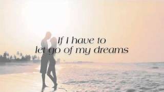 Video voorbeeld van "If That's Love - Laura Pausini (lyrics)"