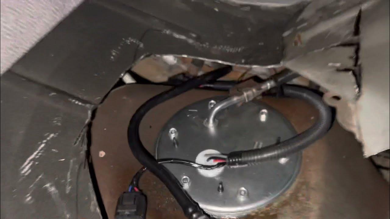 1999 Ford Explorer fuel pump installed. Access port cut. No dropping