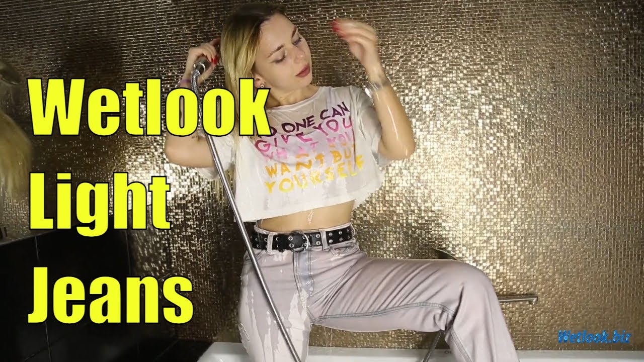 ⁣Wetlook girl gets wet in the bathroom under the shower | Wetlook light jeans | Wetlook Hair